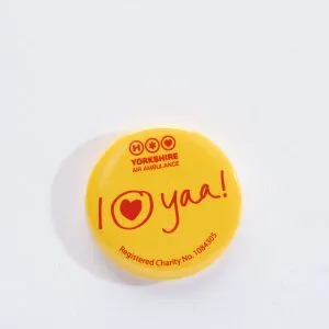 YAA Yellow Button Badge