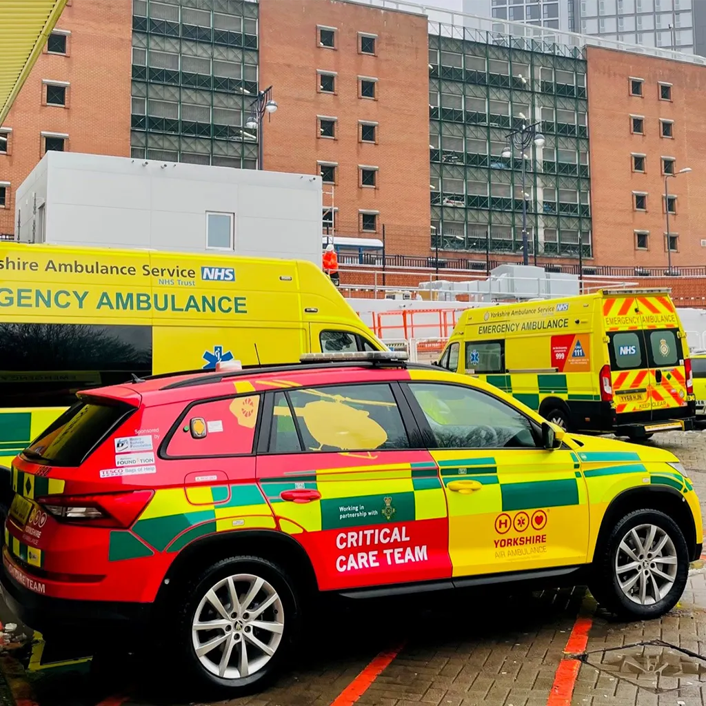 Yorkshire Air Ambulance Rapid Response Vehicle with ambulances in the background