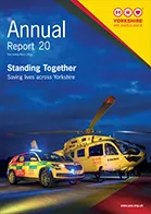 Image of the front cover of the YAA Annual Report 20, which shows a YAA helicopter and rapid response vehicle lit up against a night sky