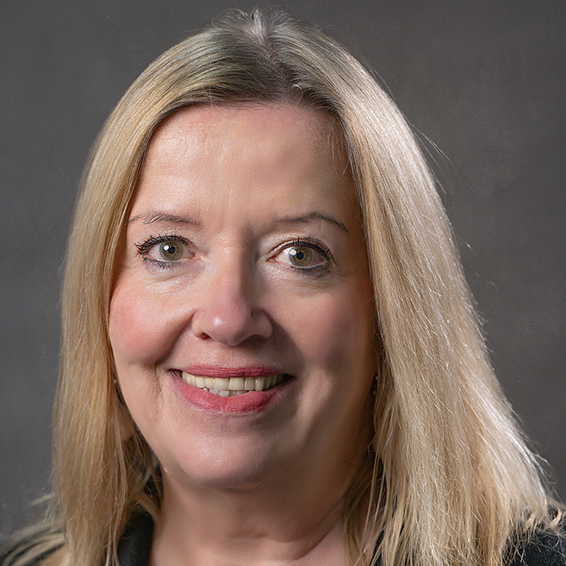 Head shot of a lady with long blonde hair